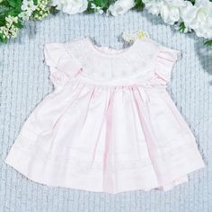 Adorable Vintage Baby Dress From Macy's Is Light Pink And Has Floral Lace Around The Neck And Hem, Ruffled Sleeves, Zip Closure In The Back. Includes Matching Pink Short Puff Sleeve Jacket With Single "Pearl" Button Closure. 50% Rayon, 50% Polyester. Nwt - Small Gray Mark On The Back Of The Jacket's Right Sleeve, And Small Pale Yellow Spot On The Back Of The Jacket (Pictured) - Otherwise In Perfect Condition. Size 9 Months. Spring Long Sleeve Baptism Dress With Ruffles, Spring Long Sleeve Ruffle Baptism Dress, Spring Baptism Dress With Long Sleeves And Ruffles, Cute Baptism Dress With Ruffles For First Birthday, Pink Baptism Dress For Spring, Spring Baptism Dress With Lace Trim, Fitted Spring Baptism Dress For First Birthday, Fitted Pink Baptism Dress With Ruffles, Cute Fitted Baptism Dress With Ruffles