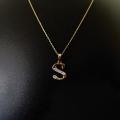 This is an exquisite initial diamond charm pendant set in 14K Solid Gold.  An elegant design, perfect for any occassion ITEM DETAILS: ✓ Letter  : S ✓ Gold Kt: Solid 14K Yellow Gold ✓ 14 K Gold Weight : 1.14 grams ✓ Diamond Shape/ Cut: Round Brilliant ✓ Diamond weight: 0.08 carats  ✓ Diamond No.: 8 Natural Diamonds ✓ Diamond Color: I-J ✓ Diamond Clarity: SI ✓ Gross Weight: 1.16 grams >>The Gold purity is guaranteed and it comes with authentic 14K gold hallmark. >>Jewlery Report provided as well certified by International Gemological Institute (IGI). >>A-Z letters available on my Etsy Shop. CUSTOMER SUPPORT: We are available 24/7 to respond to all your queries! PACKAGING: The pendant comes in layers of safe and secure wrapping along with a free Handmade Jewelry Box. Initial Pendant Necklace With Diamond Accents For Anniversary, Anniversary Initial Pendant Necklace With Diamond Accents, Anniversary Pendant Necklace With Diamond Accents, Yellow Gold Diamond Necklace With Initials For Anniversary, Anniversary Yellow Gold Diamond Necklace With Initials, Gold Initial Necklace With Single Diamond For Anniversary, S Pendant Letter Gold, Diamond Necklace With Initial Pendant For Anniversary, Diamond Necklace With Single Diamond Initial Pendant For Anniversary