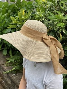 "Floppy straw beach hat with natural linen ribbon and bow. Summer straw hat is perfect for wearing to the beach, a picnic, out and about in town on a warm, sunny day! Natural linen bow Grosgrain ribbon interior headband Brim size - 5 1/4\" Full diameter - 18\" Head size - 21\" Wire in brim edge for shaping Sun n' Sand Headwear Condition is very good." Straw Beach Hat, Summer Straw Hat, Straw Hat Beach, Linen Ribbon, Summer Hat, Beach Hat, Summer Hats, Sun Hat, Straw Hat