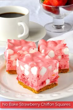 two pieces of cake on a plate with marshmallows in the top layer