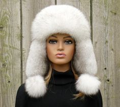 "Fur hats are one of the hottest fashion trends right now. This stylish accessory will make any outfit look cooler and more fashionable. Made of natural fur and genuine leather, this gorgeous hat with the adjustable size is a must-have for your wardrobe. Try on a new style and create and chic look by trying on a beautiful fur hat. + Highlights Made from Fox fur and Real Leather Color Fur - White with black tips (veil) Color Leather - White One Size Hat - 55 cm - 57 cm / 21.7 - 22.4\" Lining - sa Fluffy Winter Hat, White Fur Hat, Drawing Fur, How To Draw Fur, Veil Color, Fuzzy Hat, Fluffy Hat, Fur Trapper Hat, Fur Trapper