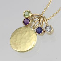 "Beautifully crafted Diamond and 14ky gold pendants on a 16\" 14ky gold chain. Hammered disc is about 1/2 of an inch in diameter. Diamond is a 3mm SI1. Very contemporary, classy, and timeless. Birthstone for April. Comes with a lifetime warranty, polishing cloth, and a gift box." Gold Plated Birthstone Necklace With Round Pendant, Gold Plated Yellow Gold Birthstone Necklace, Yellow Gold Plated Birthstone Necklace With Round Pendant, Yellow Gold Birthstone Necklace With Round Pendant, Yellow Gold Coin Necklace With Stamped 14k Round Pendant, Recycled Gold 14k Stamped Round Pendant Necklace, Gold Birthstone Jewelry With Round Disc, 14k Stamped Round Pendant Necklace In Recycled Gold, Yellow Gold Birthstone Round Pendant Necklace