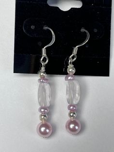 Pale pink freshwater pearl and quartz drop earrings featuring sterling hooks which hang approximately 1 1/2 inches from piercing.  Handmade. Handmade Pink Drop Pearl Earrings, Handmade Pink Pearl Drop Earrings, Pink Pearl Drop Teardrop Earrings, Pink Teardrop Pearl Drop Earrings, Pink Drop Earrings With Ear Wire, Pink Dangle Pearl Earrings With Ear Wire, Pink Sterling Silver Pearl Earrings For Pierced Ears, Pink Pearl Drop Earrings In Sterling Silver, Pink Dangle Pearl Earrings For Pierced Ears