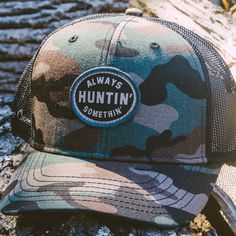 The hunt never end, it just starts all over again the next day. Get ready for the best time of the year, hunting season with our Always Huntin’ hat. Patch on our standard-low profile mesh hat in camo and black. Live Crazee stitched on the side of the mesh. Camouflage Trucker Hat With Curved Bill, Camouflage Trucker Baseball Cap For Outdoor, Camouflage Trucker Snapback Hat With Curved Bill, Outdoor Camouflage Trucker Baseball Cap, Camouflage Curved Bill Trucker Snapback Hat, Military Style Flat Brim Trucker Hat For Outdoor, Camouflage Trucker Hat For Outdoor Activities, Trucker Hat With Curved Brim For Hunting, Camouflage Military Trucker Hat For Outdoor