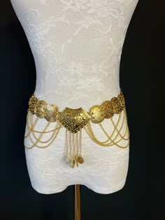 Belly Chain belt in Antique Gold finish with chain and coin detail. The large discs and intricate designs make this a stand out piece! Price per piece Belly Chain Hair Styling Tools, Greek Mythology Cosplay, Greek Belt, Mythology Cosplay, Medusa Aesthetic, Gladiator Art, Belt Styling, Gold Waist Chain, Egyptian Jewellery