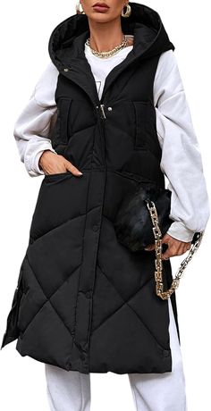 This Oversized Sleeveless Zippered Puffer Long Vest Coat is a must-have for the colder months. The zipper and puffer design provide ultimate warmth and the sleeveless style allows for layering. The oversized fit is both stylish and comfortable, making it a versatile addition to any wardrobe. 100% Polyester Hand Wash Only Material: Puffer vest for women with lining, keeps you warm and toasty all winter long Features: Ladies sleeveless down jackets with 2 hand pockets for easy storage, snap and fu Long Puffer Vest Outfit, Puffer Vest Long, Long Vest Coat, Long Puffer Vest, Sleeveless Puffer Jacket, Puffer Vest Outfit, Sleeveless Puffer, Outdoor Jackets, Snow Wear