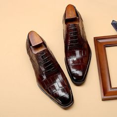 Introducing our Vintage CrocLuxe Oxford Dress Shoes, the epitome of timeless elegance and sophistication. Crafted with the finest quality genuine leather, these shoes are designed to make a lasting impression. The upper material is made from cow leather, ensuring durability and a luxurious feel, while the intricate brogue detailing adds a touch of sophistication and style. Elevate your style and make a statement with our Vintage CrocLuxe Oxford Dress Shoes. Elegant Wingtip Lace-up Shoes With Red Sole, Elegant Lace-up Shoes With Red Sole, Italian Cap Toe Oxfords For Office, Elegant Brown Lace-up Shoes For Formal Occasions, Classic Wingtip Dress Shoes With Red Sole, Classic Leather Shoes With Red Sole For Semi-formal Occasions, Classic Leather Shoes With Red Sole For Semi-formal Events, Formal Lace-up Shoes With Red Sole And Round Toe, Office Dress Shoes With Red Sole And Plain Toe