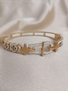 cross pattern bracelet.women's bracelet.girl's bracelet.gift bracelet.Cross patterned bracelet. A piece of jewelry that you can gift to your loved ones or that will suit you very well.mom day gift. Sister gift. Birthday gifts  html {      } https://worldshopping34.etsy.com Metal Bangle For Personalized Gifts, Handmade Gold Stainless Steel Bracelets, Metal Name Bracelet Bangle As Gift, Gold Stainless Steel Bracelets As Gift For Her, Gold Metal Rosary Bracelet As Gift, Gold Stainless Steel Bracelet As Gift For Her, Gold Metal Rosary Bracelet For Gift, Handmade Elegant Rosary Bracelet As Gift, Handmade Elegant Rosary Bracelet For Gift