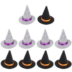 a set of six witches hats with purple ribbon around the brimmed hat, all in different sizes and colors