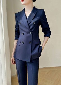 Elevate your style with the Louise Navy Blue Three-Piece Set. The double-breasted blazer exudes sophistication while the vest adds a touch of luxury. Complete the look with the nine-point pants, perfect for any business occasion. Make a statement with this exclusive, elegant set. Blazer: Double Breasted closure Notched lapels Long sleeves Front flap pockets Pants Zip fly with button closure Side slant pockets Cropped length - Polyester, spandex- Item #441501- Women's blazer & pants suit two-piece set SIZE INFO XS=US2=UK6=EU32 S=US4-6=UK8-10=EU34-36 M=US8-10=UK12-14=EU38-40 ★★ It would be helpful if you provided your height and weight so that I could assist you in choosing the appropriate size. Blue Double Breasted Tuxedo Suit For Work, Navy Notch Lapel Blazer With Double-breasted Button Fastening, Blue Double-breasted Semi-formal Suit, Tailored Blue Double Breasted Suit For Office, Blue Double-breasted Suits For Business Casual, Blue Tailored Double Breasted Office Suit, Blue Tailored Double-breasted Suit For Office, Blue Double-breasted Suit, Blue Double-breasted Suits For Office