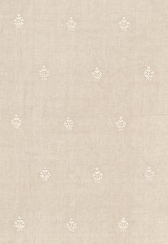 a beige background with white snowflakes on it