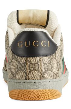 Heritage web stripes angle up the sides of a '70s-inspired, GG Supreme sneaker with enameled double-G hardware, a throwback label and a logo-stamped heel tab. Lace-up style Removable insole Textile upper/textile and leather lining/rubber sole Made in Italy Men's Designer Shoes Gucci Sporty High-top Sneakers, Brown Sneakers With Logo Print And Round Toe, Brown Round Toe Sneakers With Logo Print, Designer High-top Sneakers With Embroidered Logo, Gucci Low-top Sneakers With Logo, Gucci Leather Sneakers With Logo, Gucci High-top Logo Sneakers, Gucci High-top Sneakers With Logo, Gucci High-top Lace-up Sneakers With Logo