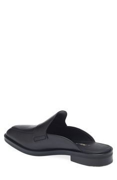 This loafer-style mule in smooth leather is a modern essential for casual and office looks. Leather upper, lining and sole Imported Modern Slip-ons With Leather Footbed For Formal Events, Loafer Style, Summer Wardrobe Essentials, Wedding Guest Shoes, Sneaker Slippers, Loafers Style, Loafer Mules, Jean Shirt Dress, Baby Boy Shoes