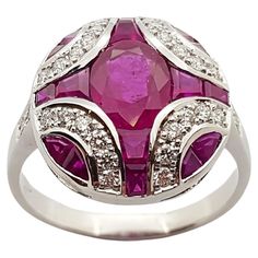 Ruby 1.54 carats with Diamond 0.34 carat and Ruby 1.35 carats Ring set in 18 Karat White Gold Settings Width: 1.6 cm Length: 1.8 cm Ring Size: 57 Total Weight: 5.38 grams "We first opened doors in 1980 when it was then situated in the vicinity of the Victory Monument; a small and modest storefront with a couple of counters. From its humble beginnings to where it stands today, our company has proven its abilities as a jeweler. Since the beginning, we have been supplying fine quality pieces to dea Luxury Brilliant Cut Ruby Ring In Diamond White, Luxury Ruby Ring With Brilliant Cut In Diamond White, Luxury Ruby Ring With Diamond Accents And Round Shape, Luxury Round Ruby Ring With Diamond Accents, Luxury Marquise Ruby Ring With Diamonds, Luxury Gia Certified White Gold Ruby Ring, Fine Jewelry Ruby Ring With Pave Setting, Luxury Platinum Ruby Ring, Gia Certified Fine Jewelry Ruby Ring In Platinum