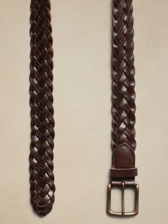 A mastery of impeccable design, this sophisticated belt is made from soft braids of luxurious of leather that make an incredibly intricate, yet sturdy silhouette.  #712658 Width: 1. 75" (4. 5cm) Formal Leather Rope Belt, Formal Woven Leather Belt, Classic Leather Rope Belt, Classic Braided Leather Belt, Classic Woven Leather Belt, Soft Braids, Braided Leather Belt, Braided Leather, Leather Belt