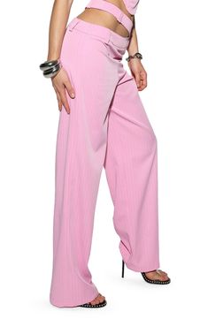 Influenced by traditionally polished tailoring, these pinstriped wide-leg pants are revamped in bubblegum pink and boast a Y2K-inspired split waistband. 31" inseam; 22" leg opening; 11" front rise; 14" back rise (size Medium) 96% polyester, 4% elastane Dry clean or machine wash, line dry Imported Pinstripe High Waist Pants For Spring, Pink Stretch Wide Leg Pants, Stretch Pants With Vertical Stripes For Spring, Spring Striped Wide Leg Pants, Trendy Pinstripe Wide Leg Bottoms, Spring Wide Leg Pants With Vertical Stripes, Pinstripe Wide Leg Bottoms For Summer, Trendy Pinstripe Wide Leg Pants, Trendy Pinstripe Bottoms For Spring