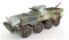 a toy army vehicle is shown on a white background