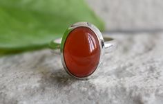 Handmade design ring all ring sizes available >>stone name=natural carnelian >>stone size=13mm length 9mm width 925 silver ring handmade ring (you will get exact item that you see in the photo) the images are not edited all images are genuine. if u any question for item please feel free and contact me. we are very happy to help you. important note------ #we shipped your item 1-3 business days #item delivery time-2-3 weeks. thank you. Oval Carnelian Orange Ring, Polished Carnelian Oval Rings, Oval Orange Carnelian Rings, Orange Oval Carnelian Rings, Oval Carnelian Moonstone Ring For Anniversary, Orange Carnelian, Super Dark, Carnelian Ring, Carnelian Stone