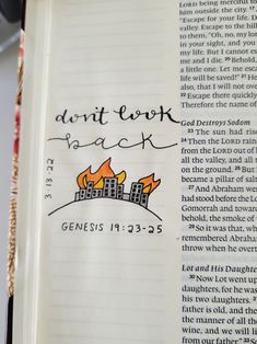 an open bible with the words don't look back on it and flames coming out