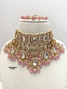 Premium quality elegant Kundan choker comes with Jhumki Earrings with attached saharey and Tikka/ Indian Jewelry/Premium Quality Polki and Kundan Jewelry/bridal necklace/pink  All items are shipped from Brampton, Ontario, Canada. If you need your item by a certain day, please reach out to us for express delivery option before placing the order so that we can update the shipping for you. Standard shipping/delivery timeline Below are the delivery timeline estimates. We dispatch all orders by the n Light Pink Indian Jewellery, Luxury Kundan Bridal Earrings With Intricate Design, Luxury Diwali Choker With Intricate Design, Elegant Luxury Pink Kundan Necklace, Luxury Elegant Pink Kundan Necklace, Luxury Pink Kundan Necklaces, Luxury Pink Kundan Necklace, Pink Bridal Sets For Party And Festive Occasions, Pink Bridal Sets For Party