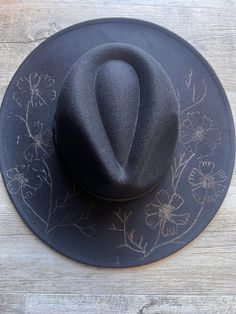 Gorgeous hand burnt freehand designed Fedora hat. Hats measure: 37.5x40x13cm and max head circumference is 57cm but can be adjusted down with a tie that sits within a comfortable band. if you require a larger size please message us after ordering. **Designs can/do vary as they are custom designed** Adjustable Wide Brim Top Hat As Gift, Black Handmade Felt Hat For Rodeo, Handmade Black Felt Hat For Rodeo, Handmade Flat Crown Hat For Rodeo, Custom Handmade Black Felt Hat, Custom Black Handmade Felt Hat, Handmade Black Felt Hat With Flat Brim, Handmade Black Fedora For Rodeo, Handmade Black Fedora With Curved Brim