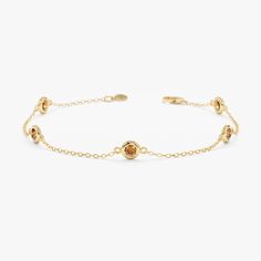 This captivating bracelet features a collection of sparkling citrine gemstones, each meticulously cut and polished to enhance their warm golden hues. The citrines are spaced evenly along a delicate chain, crafted from 14k solid gold (available in yellow, rose, or white gold). This station bracelet design creates a look that is both elegant and eye-catching. - Handmade - Solid Gold - Natural Citrine - Total Citrine Carat Weight: 0.60 ctw - 5 Citrine Bezels: 0.12 ctw each - Size of Bezel: 5mm 🛠 Your Sarah Elise piece is handcrafted with care! Ready-to-ship items go out within 3 business days. Made-to-order pieces typically take 7-10 business days to create. If you need something sooner, please contact us - we'll see if we can make it happen! For estimated shipping dates and tracking, check Memory Ring, Peridot Bracelet, Station Bracelet, Citrine Bracelet, Bracelet Tennis, Set Bracelet, August Birthstone, Dainty Chain, Peridot Gemstone