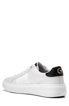 This sporty and stylish sneaker is a comfortable footwear staple you'll want to wear with every outfit. Cushioned insole White sole Leather upper/textile and leather lining/rubber sole Imported White Round Toe Sneakers, White Synthetic High-top Sneakers With Textured Sole, White High-top Synthetic Sneakers With Textured Sole, Modern Synthetic Sneakers For Light Sports, Modern Synthetic Skate Shoes For Light Sports, White Low-top Sneakers In Tpr, White Skate Shoes With Textured Sole For Sports, Sporty Synthetic Slip-on Skate Shoes, Synthetic Skate Shoes With Vulcanized Sole For Light Sports