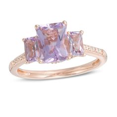 A classic look in romantic color, this gemstone and diamond ring is a stunning accessory she'll wear with everything. Crafted in 14K rose gold, this bold three-stone design showcases a trio of emerald-cut soft-purple Rose de France amethyst - the largest the 8.0 x 6.0mm center stone - each wrapped in a diamond-touched setting. Diamonds line the shank and gallery for an added hint of shimmer. Radiant with 1/6 ct. t.w. of diamonds and a brilliant buffed luster, this choice offers eye-catching styl Elegant Rose Gold Diamond Ring With Accent Stones, Elegant Rose Gold Three Stone Ring, 14k Rose Gold Rings With Diamond Accents, Fine Jewelry 14k Rose Gold Rings With Diamond Accents, Fine Jewelry Amethyst Ring In Rose Gold, Rose Gold Amethyst Ring Fine Jewelry, Amethyst Diamond Ring In Rose Gold, Elegant Rose Gold Three-stone Diamond Ring, Elegant Rose Gold Three Stone Diamond Ring