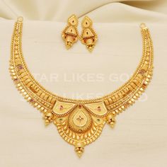 Adorn yourself with this elegant gold necklace, featuring a delicate chain and a stunning, handcrafted pendant. Its versatile design makes it a perfect accessory for both casual and formal looks, adding a subtle touch of glamour to your ensemble. 22kt yellow gold handmade necklace jewelry from Rajasthan India. Brand- StarLikesGoldIndia Weight- 26.63 grams approx. Metal- yellow gold real gold. Metal purity- 22 Karat. Max Length - Necklace 4 inches approx. Earrings - 3 centimeter approx Max Width- Gold Necklaces With Elegant Design For Anniversary, Gold Bridal Necklace With Pendant And Elegant Design, Gold Temple Jewelry Chain Necklace Gift, Gold Temple Jewelry Style Chain Necklace, Gold Necklace With Elegant Design For Festive Occasions, Gold Necklaces With Elegant Pendant Design, Elegant Yellow Gold Bridal Necklace As Gift, Gold Chain Necklace With Simple Design For Gift, Gold Temple Jewelry Necklaces As Gift