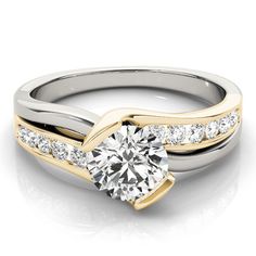 two tone gold and white gold engagement ring with channel set diamonds on the sides,