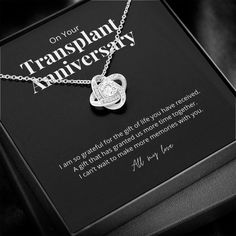 Commemorate a special milestone for your loved one on their transplant anniversary. Crafted with brilliant 14k white gold over stainless steel, swinging from an adjustable cable chain and fastened securely with a lobster clasp — the center cubic zirconia crystal measures 6mm in diameter, and is surrounded with smaller cubic zirconia, showcasing added sparkle and shine to this gorgeous gift. You must see it for yourself! Specifications: • 14k white gold over stainless steel • 6mm round cut cubic Meaningful Birthstone Necklace For Anniversary, Adjustable Birthstone Necklace For Anniversary, Gift White Gold Birthstone Necklace With Cubic Zirconia, White Gold Birthstone Necklace For Valentine's Anniversary, White Gold Birthstone Necklace For Anniversary On Valentine's Day, White Gold Birthstone Necklace For Anniversary On Mother's Day, Adjustable Birthstone Necklace For Anniversary And Mother's Day, Elegant Adjustable Birthstone Necklace For Anniversary, Adjustable Sterling Silver Birthstone Necklace For Anniversary