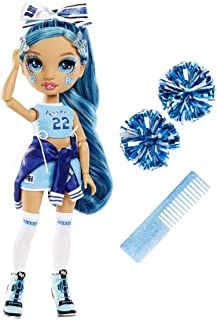 a doll with blue hair and accessories next to it