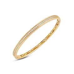 There's power in sparkle. Add this classic bangle to your office ensemble and seal a deal in style. The openable rigid bracelet in yellow gold features a classic diamond pave running along half of the bangle's circumference. This chic piece can easily be paired with almost any of your outfits. Classic Bangles, Gorgeous Engagement Ring, Diamond Bangle, Love Symbols, Conflict Free Diamonds, High Quality Jewelry, Diamond Gemstone, Diamond Studs, Metal Rings