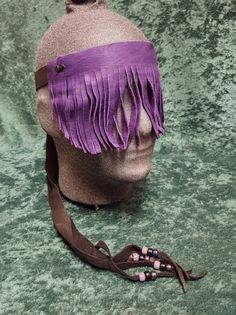 "The shaman's mask is used by many shamans to help keep their focus from being disturbed by the mundane world around them. It is also useful for ritual or meditation for the same reason. This mask is made of soft deer leather with hand cut fringe and decorative crow beads on the ties. It is in stock & ready to ship. This shorter length mask reaches just below the nose (5\" from top of brow band to bottom of fringe).  The head of the mannequin is slightly smaller that most adult human heads." Antler Mask, Goat Head Mask, Pagan Mask, Metal Jaw Mask, Shaman's Mask, Animal Skull Decor, Black Deer, Brown Deer, Animal Skull