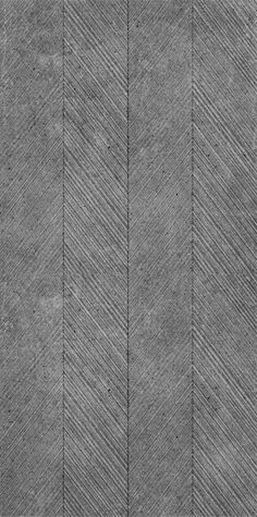 a black and white photo of an arrow pattern on concrete flooring that looks like herringbones