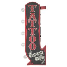 a sign that says tattoo parlor on it