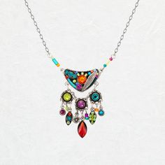 We might go as far to say that this necklace gives a garden full of blooming flowers a run for their money. The Firefly Botanical Bryn Necklace is simply bursting with color! You heard it here. We are still trying to catch our breath since we first laid eyes on this necklace and adds a dash of dazzle to your ensemble. We are certain that you will be reaching for the Firefly Botanical Bryn Necklace time and time again. Retired Multi-color European crystals, Czech glass Chain approximately 18 inch Multicolor Fusion Necklace For Gift, Multicolor Fusion Necklaces For Gifts, One Of A Kind Multicolor Fusion Jewelry, Artistic Multicolor Necklaces For Festival, Multicolor Necklaces With Detachable Pendant, Multicolor Multi-stone Fusion Necklaces, Multicolor Multi-stone Fusion Necklace, Red Bohemian Flower Pendant Jewelry, Bohemian Red Flower Pendant Jewelry