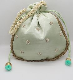 "ethnic traditional indian wedding gota patti zardosi embroider potli bag handbag for woman | potli bag for return gift | indian wedding gift Package Contents: 1 Size: 10\" x 8\" Designed with the heart, this beautiful Potli or batawa bag are eye catchy and made of premium material. Key Features: Ark Work. This potli is good match with both Indian and western outfits and are superb for wedding and festive parties. This would be best complement to your designer saree, lenhga or any other kind of Diwali Handwork Pouch Potli Bag, Diwali Handwork Potli Pouch Bag, Diwali Potli Bag With Pallu, Navratri Zari Work Potli Pouch Bag, Navratri Zari Work Potli Bag, Diwali Dori Work Potli Pouch Bag, Traditional Resham Embroidered Potli Bag For Diwali, Traditional Gota Work Potli Bag For Festive Occasions, Traditional Festive Potli Bag With Gota Work