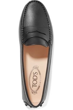 Black Gommino leather loafers | Tod's | NET-A-PORTER Elegant Slip-on Calf Leather Loafers, Classic Calf Leather Almond Toe Slip-ons, Luxury Slip-on Tassel Loafers With Leather Lining, Luxury Leather Sole Slip-on Loafers, Luxury Slip-on Loafers With Leather Sole, Timeless Slip-on Loafers With Leather Lining, Classic Calf Leather Slip-ons With Round Toe, Classic Calf Leather Slip-ons With Flat Heel, Designer Slip-on Loafers With Rubber Sole