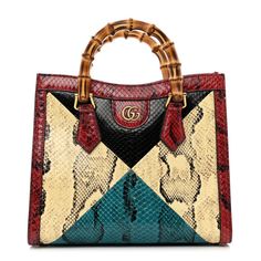 This is an authentic GUCCI Snakeskin Geometric Small Diana Tote in Wild Red and Multicolor. This shoulder bagis crafted of multicolored snakeskin in red, beige, blue and black. The bag features wooden handles and a GG interlocking logo in gold. This opens to a red leather interior with a patch pocket. Red Gucci Bag, Bags Designer Fashion, Blue And Black, Clothing Company, Leather Interior, Wooden Handles, Gucci Bag, Snake Skin, Red Leather