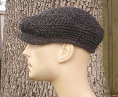 "This chunky golf cap is crocheted in a bulky wool blend yarn in charcoal grey. It fits an average teen or adult head of 20 to 23 inches. Hand wash, dry flat. Every item from Pixiebell is handmade and knit or crocheted to order, unless otherwise stated in title of the item as \"ready to ship\". Production time may vary, please check the SHIPPING & POLICIES tab for accurate processing times. If you need an item promptly, please contact us so that we can make arrangements. If you are intereste News Boy Cap, Peaky Blinders Cap, Cap Crochet, Crochet Baby Bonnet, Womens Hat, Cap Patterns, Crochet Cap, Cap Designs, Bonnet Hat