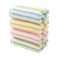 five multicolored towels stacked on top of each other