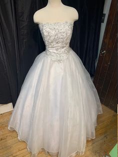 Handmade to order - process takes 2 to 4 weeks.  Can be made in any color combinations-the possibilities are endless!!  Custom, one-of-a-kind gowns are my specialty The skirt is made of 6 layers of fabric to make it full volume, including a satin underskirt, 3 layers of tulle, organza, and specialty embellished organza topskirt Lace Bodice is fully lined and boned, and features 100's of genuine Swarovski crystals.  Can be made with zipper back closure, or lace-up back ~PRICE WILL BE DETERMINED ON THE FABRIC AND TRIM CHOICES THAT ARE SELECTED The Price could be Higher or Lower depending on the Fabric & Trim Choices that are made.... When you order the dress you will provide us with a few measurements and the dress is custom made to fit you! each dress is one of a kind. All sales are final - Organza Ball Gown With Fitted Bodice For Quinceanera, Princess Ball Gown For Wedding And Prom Season, Quinceanera Dress With Fitted Organza Bodice, Elegant Gown With Lined Bodice For Quinceanera, Organza Ball Gown For Prom Season, First Communion Ball Gown With Fitted Bodice, Ball Gown For Debutante Ball With Lined Bodice, Fitted Bodice Organza Quinceanera Ball Gown, Lined Bodice Ball Gown For Debutante Ball