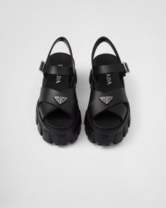 Upper with metal buckle Enameled metal triangle logo Rubber sole: 55 mm Lug sole Prada Foam Rubber Sandals Outfit, Prada Rubber Sandals Outfit, Prada Monolith Sandals Outfit, Prada Sandals Outfit, Prada Rubber Sandals, Prada Nappa Sandals, Prada Monolith Lace-up Shoes, Prada Sandals, Porcelain Candle