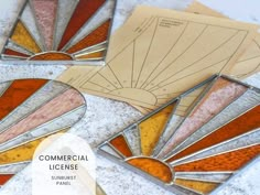 four stained glass coasters with the words hobby license on them and an image of a sunburst