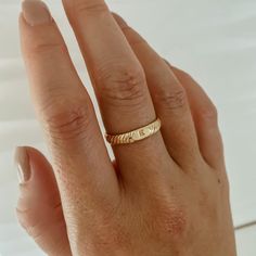 Our initial signet ring is an everyday staple, personalized. It is the perfect piece to showcase yourself or someone you love. This ring is designed with an etched gold band and an initial centerpiece. - Handmade to order - 14k gold filled 14k Gold Signet Ring With Initials For Promise, Everyday Yellow Gold Signet Ring With Initials, Classic Yellow Gold Signet Ring With Initials, Gold Signet Ring With Initials For Gift, Personalized Yellow Gold Signet Ring With Initials, Gold Band, Signet Ring, Stacking Rings, Custom Rings