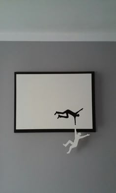 a black and white drawing of a person falling off the wall with their feet in the air