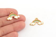 small gold plated rainbow charms with white clouds