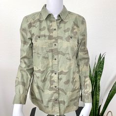 Never Worn. Relaxed Boyfriend Classic Button-Down Women’s Top. Metal Buttons. Buttoned Cuffs. Double Breasted Buttoned Pockets. Side Seam Gussets At Hem. Size Xs - Generous Pit To Pit: 18.5” Length: 25.5” Front, 27” Back Casual Camouflage Shirt For Fall, Military Style Tops With Buttons For Fall, Military Style Button-up Tops For Fall, Fall Military Style Button-up Top, Spring Military Style Tops With Buttons, Military Style Button-up Tops, Camouflage Button-up Top For Fall, Green Floral Print Button-up Camp Shirt, Military Style Cotton Tops With Snap Buttons