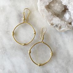 Golden Hoop Earrings Classic Handmade Gold Hoop Earrings, Handmade Classic Gold Hoop Earrings, Gold Open Circle Hoop Earrings, Yellow Gold Hoop Jewelry In Brass, Gold Recycled Hoop Earrings, Yellow Gold Hoop Earrings In Brass, Artisan Gold Dangle Hoop Earrings, Gold Hoop Earrings In Recycled Gold, Gold Nickel-free Open Circle Hoop Earrings